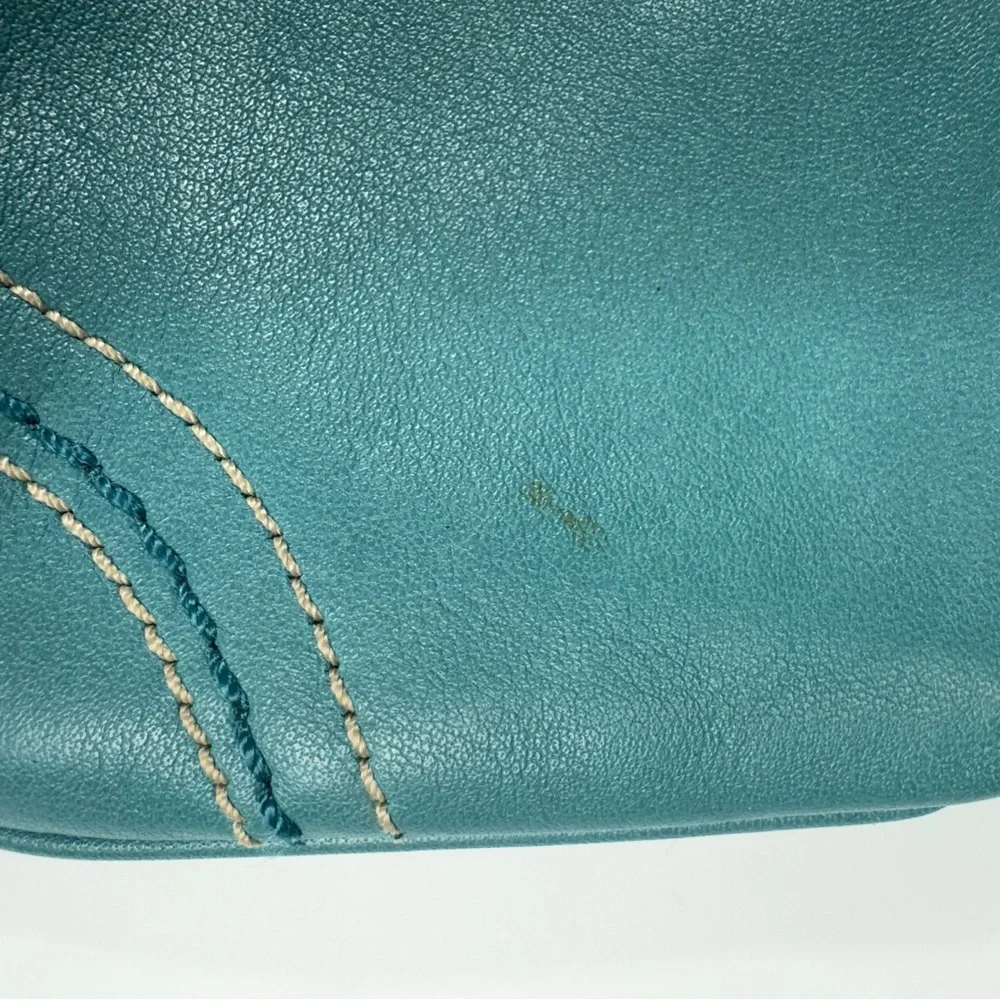 Coach turquoise leather wristlet w orig Coach hangtag, trigger snap closure